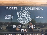 Joseph E Komenda